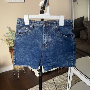 High waisted, acid wash denim shorts.
